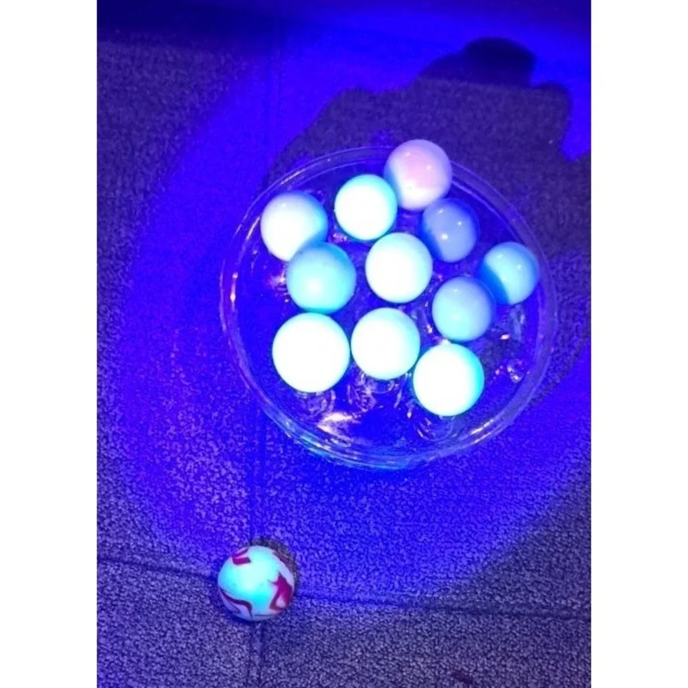 Lot Of 11 Estate Sale Marbles All UV Reactive Plus 1 UV Reactive Shooter Marble.
